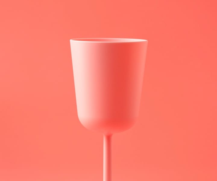 a pic of something pink that looks like a cup with a pink backgorund color